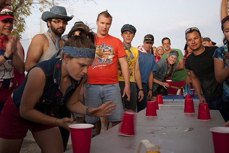 We play beer pong in between kickball innings for extra high stakes